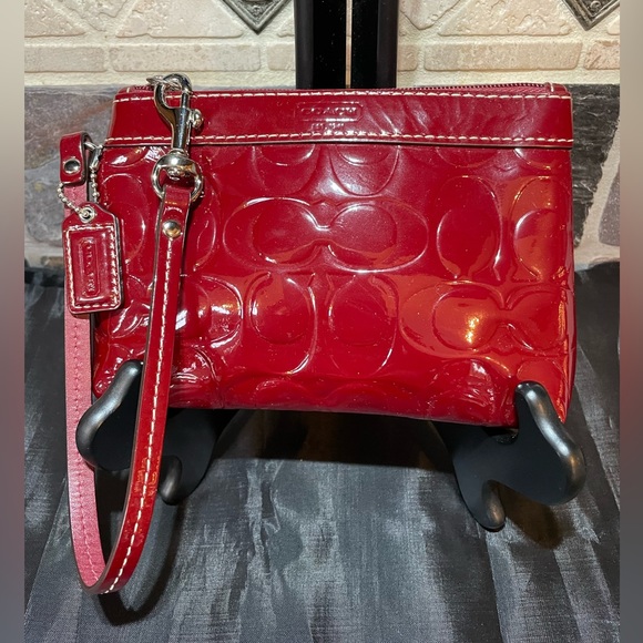 NWOT Coach wristlet in burgundy patent leather with monogram C’s - Picture 2 of 5